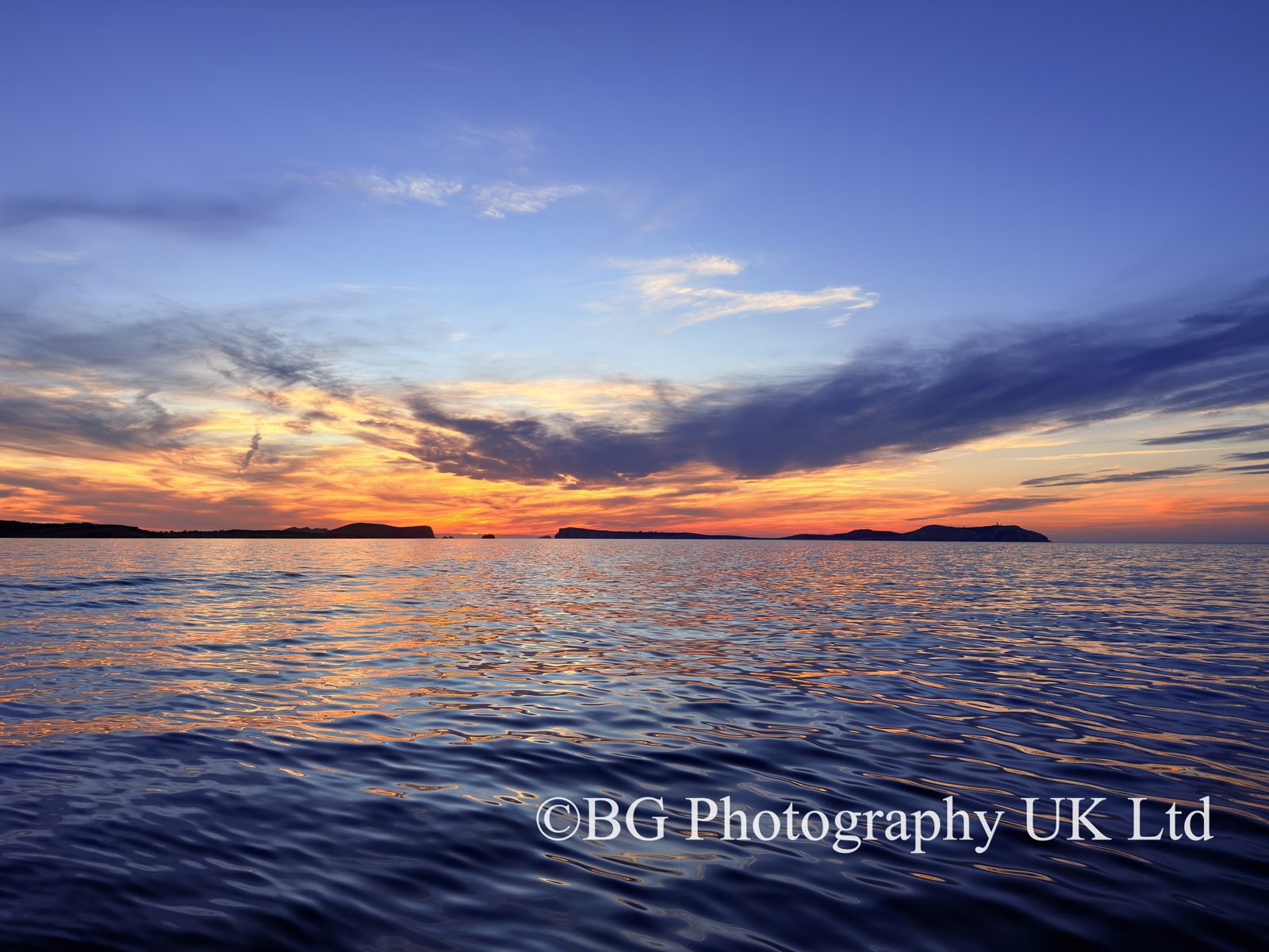 Sunset At Sea