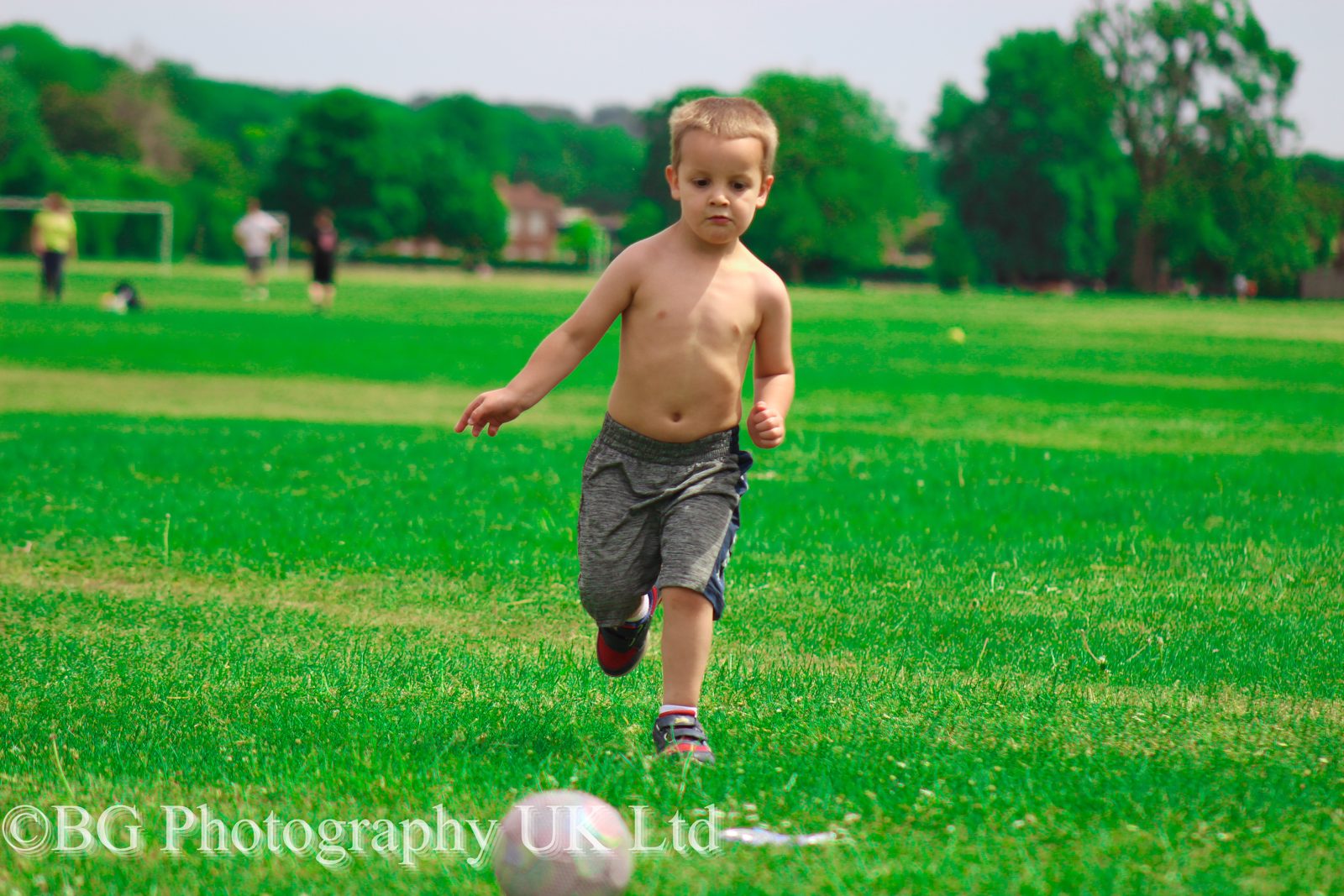 Child Playing Football